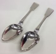 A pair of heavy fiddle pattern silver tablespoons.