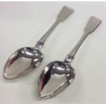 A pair of heavy fiddle pattern silver tablespoons.