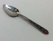BERNARD INSTONE: A heavy silver tapering spoon wit
