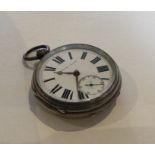 A silver open faced pocket watch with white enamel