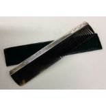 A large silver and tortoiseshell comb engraved wit