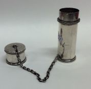 An unusual silver cylindrical travelling case on s