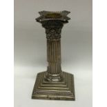 An Edwardian silver Corinthian column candlestick