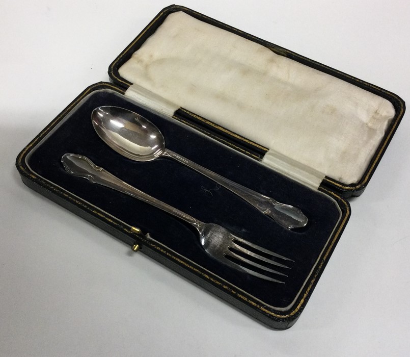 An Edwardian silver two piece christening set. She