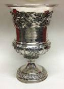 A good George IV silver goblet profusely decorated