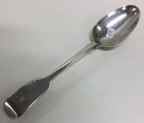 A heavy silver fiddle pattern tablespoon. London.