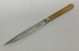 An unusual silver knife attractively engraved with