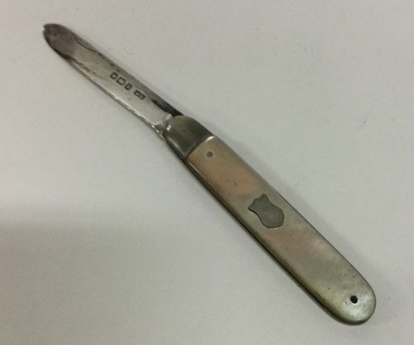 A Victorian silver and MOP fruit knife. Approx. 20