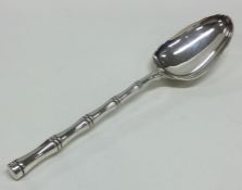 An Edwardian silver christening spoon of bamboo fo