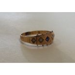 A 15 carat gold sapphire and pearl ring. Approx. 2