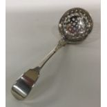 A heavy silver fiddle pattern sifter spoon. London