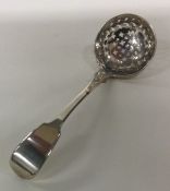 A heavy silver fiddle pattern sifter spoon. London