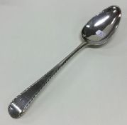 A crisp Georgian silver bright cut tablespoon with