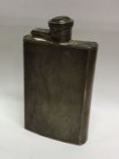 A heavy engine turned silver hip flask with lift-o