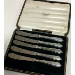A cased set of five silver handled knives. By Mappi
