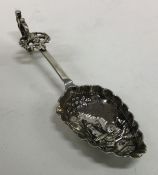 An Antique Dutch silver caddy spoon mounted with w