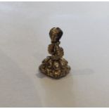 An Antique seal with embossed decoration. Est. £30