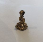 An Antique seal with embossed decoration. Est. £30