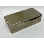 A rectangular silver hinged top cigarette box. Bir