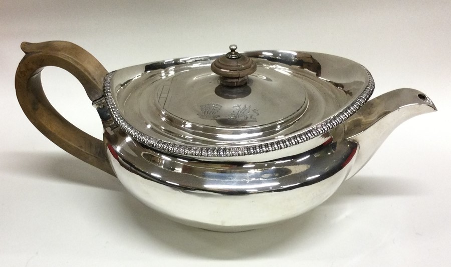 A heavy fine quality George III silver teapot with