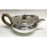 A heavy fine quality George III silver teapot with