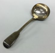 A fiddle pattern silver sauce ladle. London. By EB