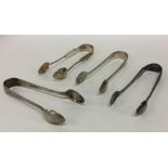 Four pairs of small silver sugar tongs. Various da