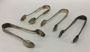 Four pairs of small silver sugar tongs. Various da