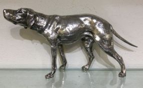 A massive German silver figure of a working dog in