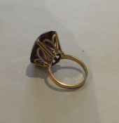 A 9 carat single stone ring in claw mount. Approx.