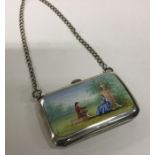 An attractive silver and enamelled purse depicting