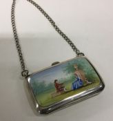 An attractive silver and enamelled purse depicting