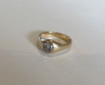 A good large diamond single stone gypsy set ring i