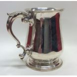 A good heavy Georgian silver baluster shaped mug.