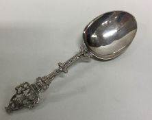 A Dutch silver spoon decorated with figures and sc