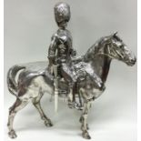EDINBURGH: A rare Scottish cast silver figure of a