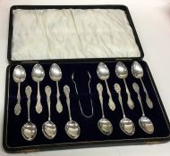 A good cased set of twelve bright cut silver teasp