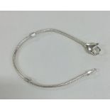 A modern silver mesh bracelet with heart shaped pa