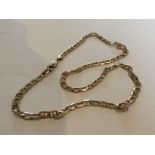 A 9 carat curb link necklace. Approx. 7 grams. Est