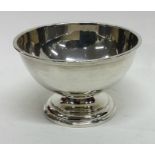 An Edwardian silver Georgian style sugar bowl on s