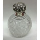 A large silver mounted hobnail cut scent bottle wi