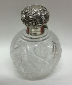 A large silver mounted hobnail cut scent bottle wi