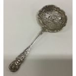 A decorative Continental silver ladle cast with fi