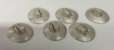 An unusual heavy set of six silver menu holders in