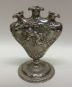 A novelty silver vase of heart shaped form with wi