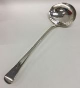 A heavy 18th Century bright cut silver soup ladle.