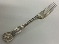 A heavy Kings' pattern silver table fork. London.