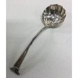 A heavy Onslow pattern silver sauce ladle with she