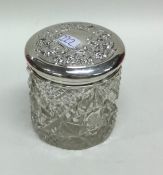 An Edwardian silver hobnail cut dressing table jar