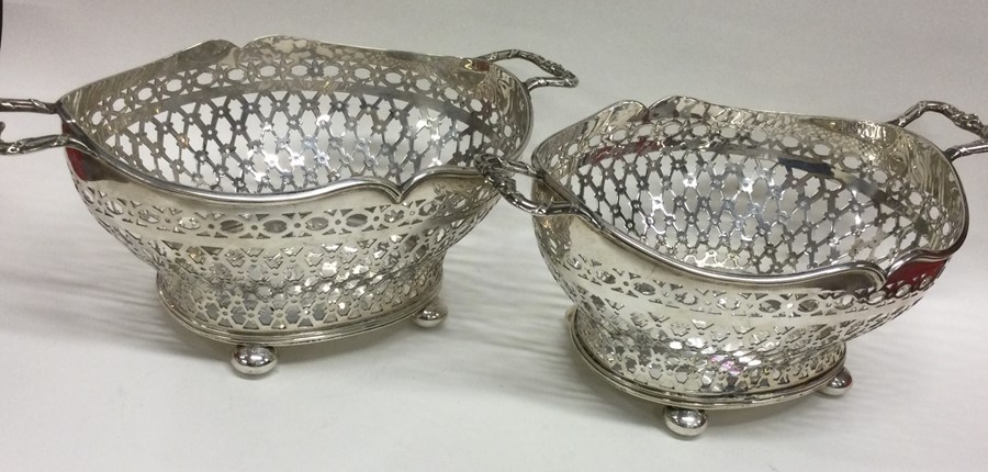 A fine pair of Edwardian silver dishes attractivel